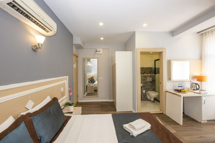 Imagen de la habitación del Legend Tulip Hotel. Foto 13