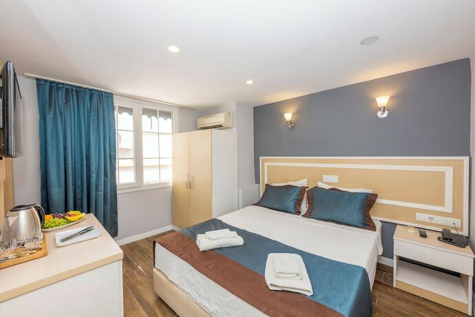Imagen de la habitación del Legend Tulip Hotel. Foto 16
