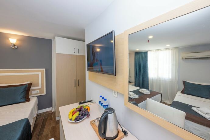 Imagen de la habitación del Legend Tulip Hotel. Foto 19