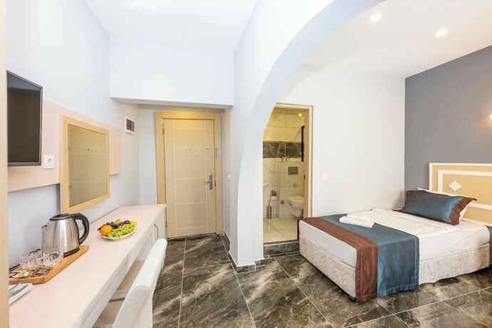 Imagen de la habitación del Legend Tulip Hotel. Foto 20