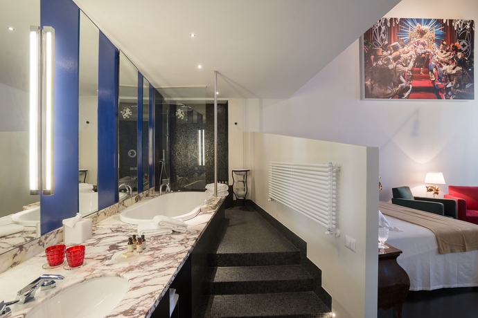 Imagen de la habitación del Leone Blu Suites | Una Esperienze. Foto 8