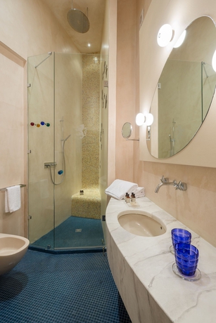 Imagen de la habitación del Leone Blu Suites | Una Esperienze. Foto 9