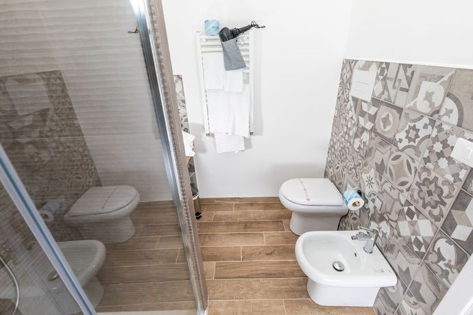 Imagen de la habitación del Leone Suite BandB. Foto 20