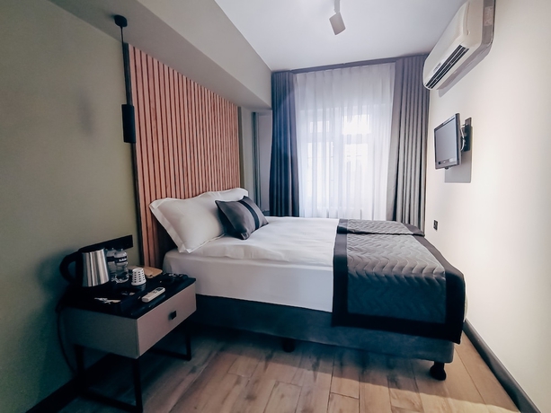 Imagen de la habitación del Leons Hotel. Foto 9
