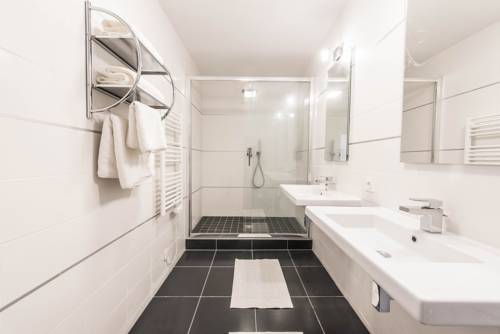 Imagen de la habitación del Les Appartements Paris Clichy. Foto 7