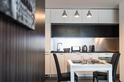 Imagen de la habitación del Les Appartements Paris Clichy. Foto 16