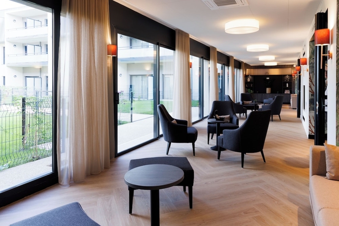 Imagen de los interiores del Les Bor&eacute;ales - Appart\'hotel Villers-sur-Mer. Foto 13