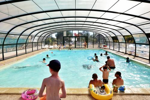 Imagen de la habitación del Les Cottages Du Lac De Miel. Foto 8
