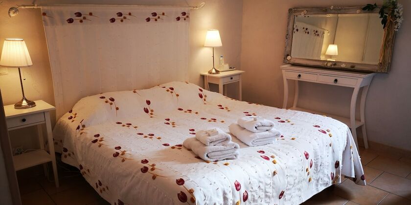 Imagen de la habitación del Les Jardins du Mas Evesque. Foto 20