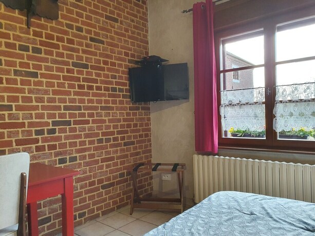 Imagen de la habitación del Les Mout'Anes. Foto 32