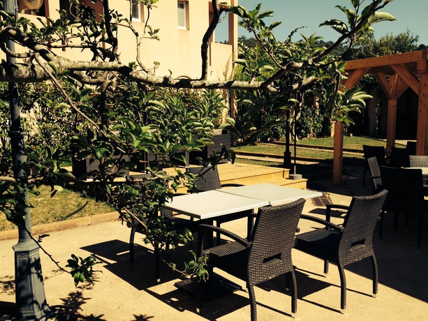 Imagen del bar/restaurante del Les Pavillons Du Golfe. Foto 2