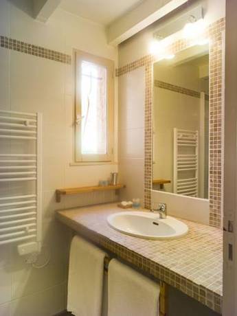 Imagen de la habitación del Les Pins De Santa Giulia. Foto 12