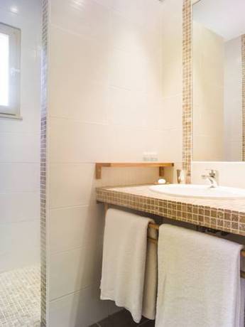Imagen de la habitación del Les Pins De Santa Giulia. Foto 16