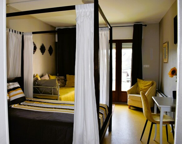 Imagen de la habitación del Les Remparts, Bénévent-l'Abbaye. Foto 20