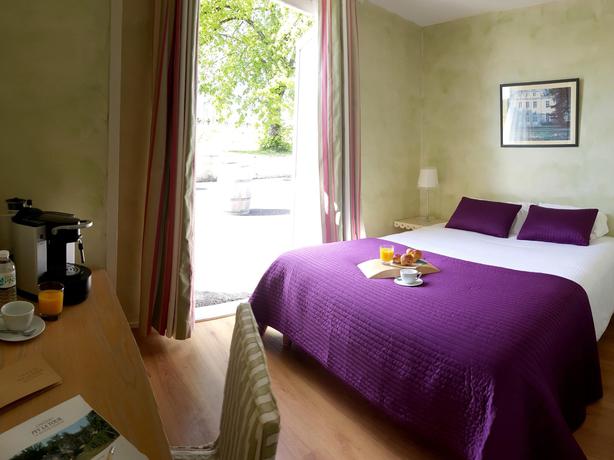 Imagen de la habitación del Les Secrets Château Pey La Tour. Foto 4