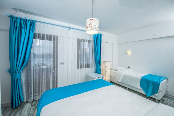 Imagen de la habitación del Les Terrasses De Selimiye. Foto 8