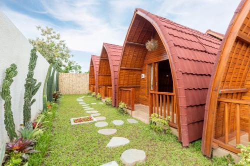 Imagen de la habitación del Les chalets Uluwatu. Foto 1