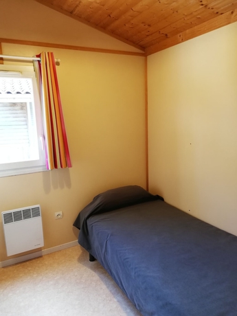 Imagen de la habitación del Les chalets de Millau. Foto 6