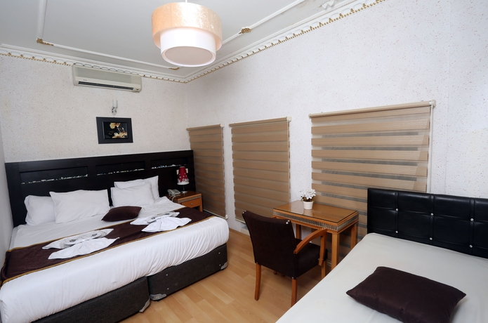 Imagen de la habitación del Letter Hotel. Foto 5