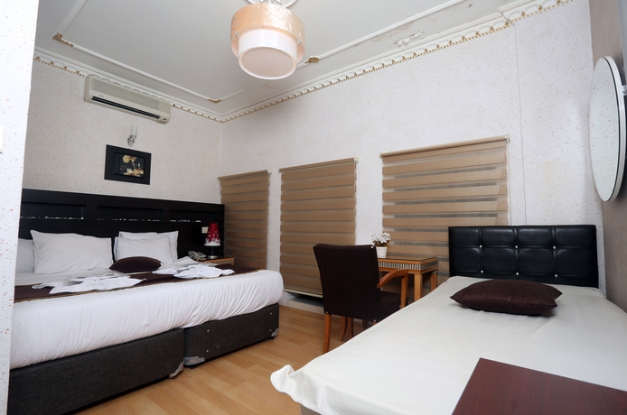 Imagen de la habitación del Letter Hotel. Foto 15