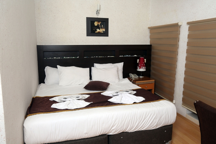 Imagen de la habitación del Letter Hotel. Foto 16