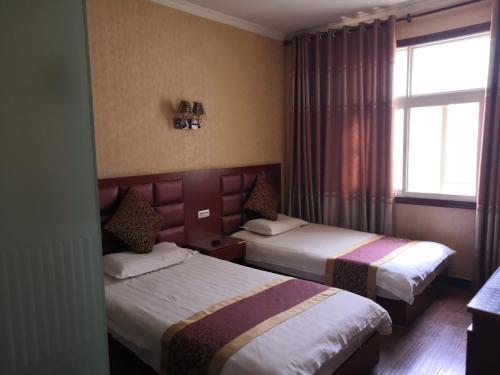 Imagen de la habitación del Li Du Hotel. Foto 6