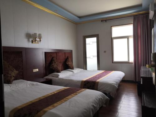 Imagen de la habitación del Li Du Hotel. Foto 7