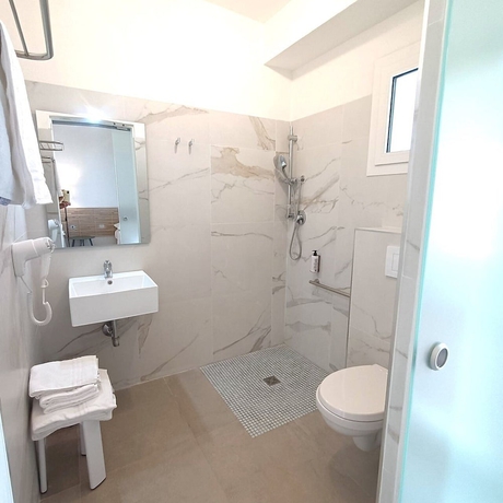 Imagen de la habitación del Lido di Alghero Beach Resort. Foto 16