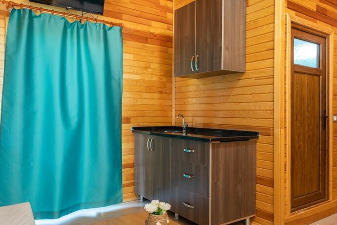 Imagen de la habitación del Likya Yanartas Bungalows. Foto 11