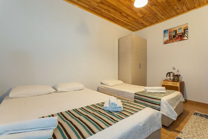 Imagen de la habitación del Likya Yanartas Bungalows. Foto 12