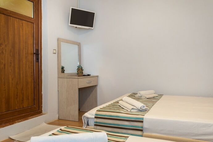 Imagen de la habitación del Likya Yanartas Bungalows. Foto 14