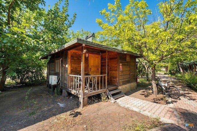 Imagen de la habitación del Likya Yanartas Bungalows. Foto 16
