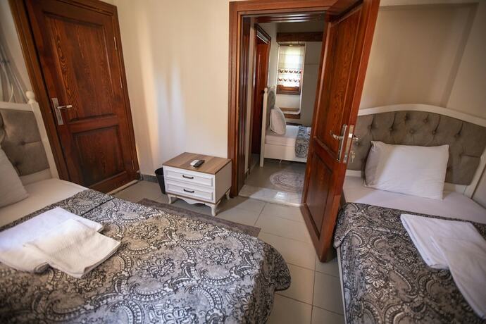 Imagen de la habitación del Lily Town Hotel. Foto 17