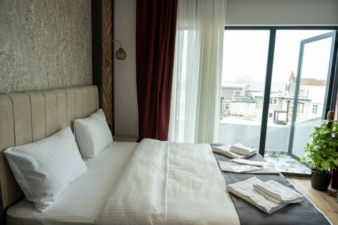 Imagen de la habitación del Linda Port Hotel. Foto 12