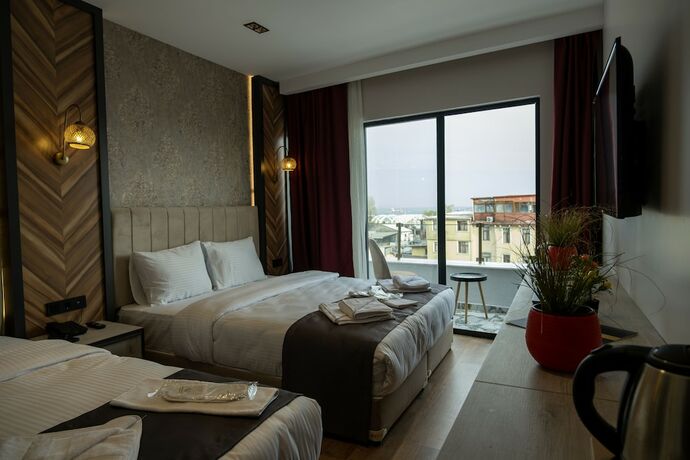 Imagen de la habitación del Linda Port Hotel. Foto 18