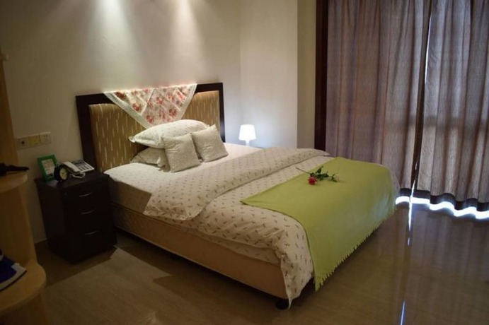 Imagen de la habitación del Lingnaying Business Apartment. Foto 12