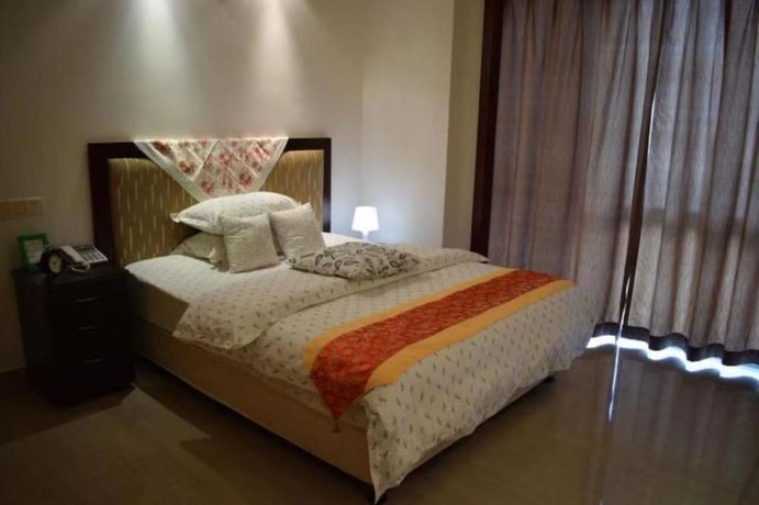 Imagen de la habitación del Lingnaying Business Apartment. Foto 13