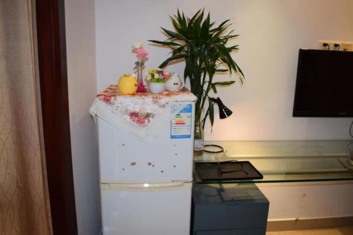 Imagen de la habitación del Lingnaying Business Apartment. Foto 16