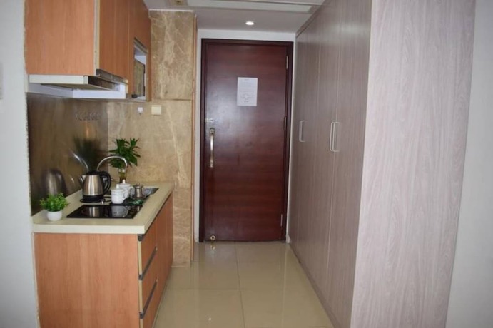 Imagen de la habitación del Lingnaying Business Apartment. Foto 19