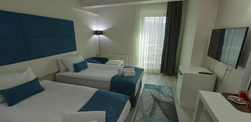 Imagen de la habitación del Lion City Hotel. Foto 4