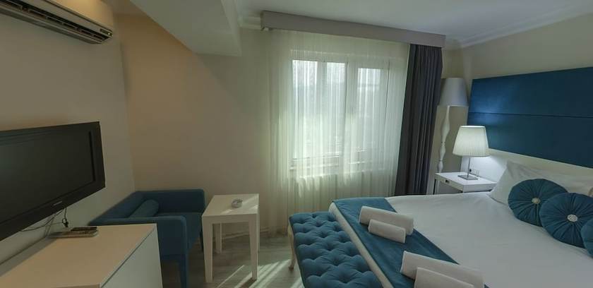 Imagen de la habitación del Lion City Hotel. Foto 5