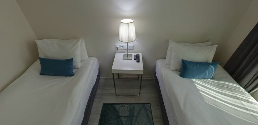 Imagen de la habitación del Lion City Hotel. Foto 7