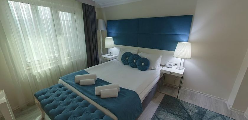 Imagen de la habitación del Lion City Hotel. Foto 9
