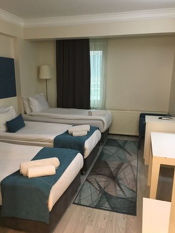 Imagen de la habitación del Lion City Hotel. Foto 15