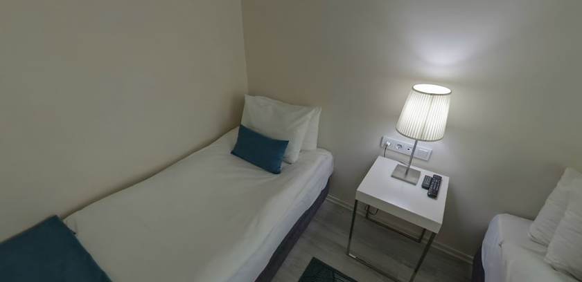 Imagen de la habitación del Lion City Hotel. Foto 17