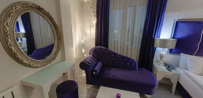 Imagen de la habitación del Lion City Hotel. Foto 18