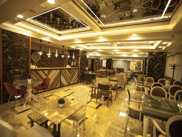 Imagen del bar/restaurante del Lion Park Suites and Residence Hotel. Foto 2