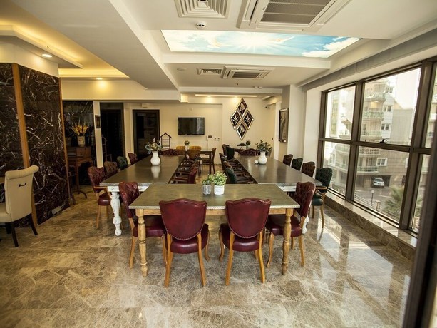 Imagen del bar/restaurante del Lion Park Suites and Residence Hotel. Foto 3