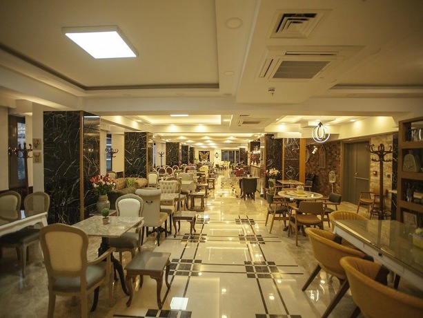 Imagen del bar/restaurante del Lion Park Suites and Residence Hotel. Foto 4