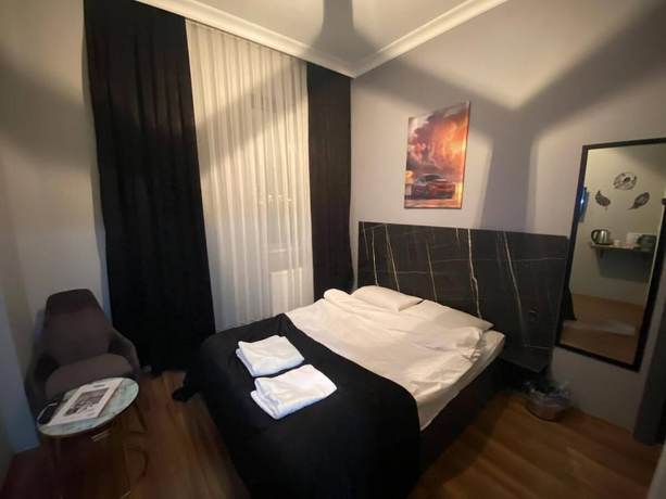 Imagen de la habitación del Lions Suit Hotel. Foto 1